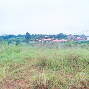 1 acre on the main tarmac road in Kimwaanyi, Kira, Wakiso, Canada Land title available